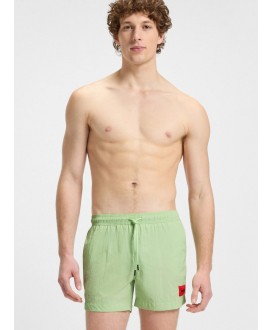 Fully lined swim shorts with red logo label